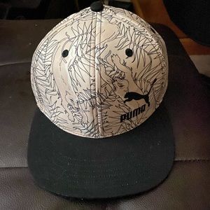 Puma cream and black snap back